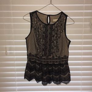 Black/nude lace peplum sleeveless blouse